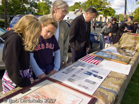 Mr. John Webster, Director, Malden Veteran Services, extensive photo display