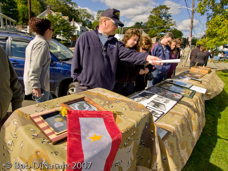 Mr. John Webster, Director, Malden Veteran Services, extensive photo display