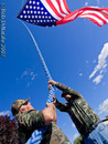 Vietnam Veteran & DPW Employee Vincent Volpe helps to raise flag